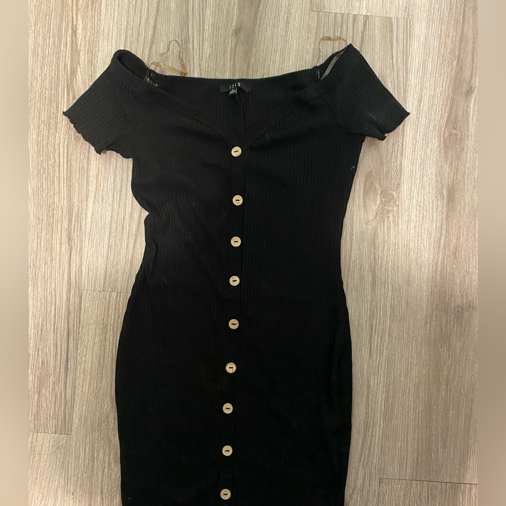 Black form fitting button down dress